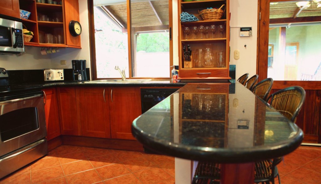 The granite kitchen island at Casa Colorado, a vacation rental home with a private pool in Tamarindo, Costa Rica