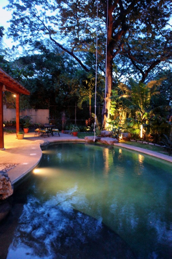 Evening light on the pool and the patio at Casa Colorado, a vacation rental home with a private pool in Tamarindo, Costa Rica